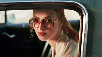 Die Dame im Auto mit Brille und Gewehr foto 2